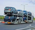 Enclosed Auto Transport vs. Open Carrier Car Transport Service